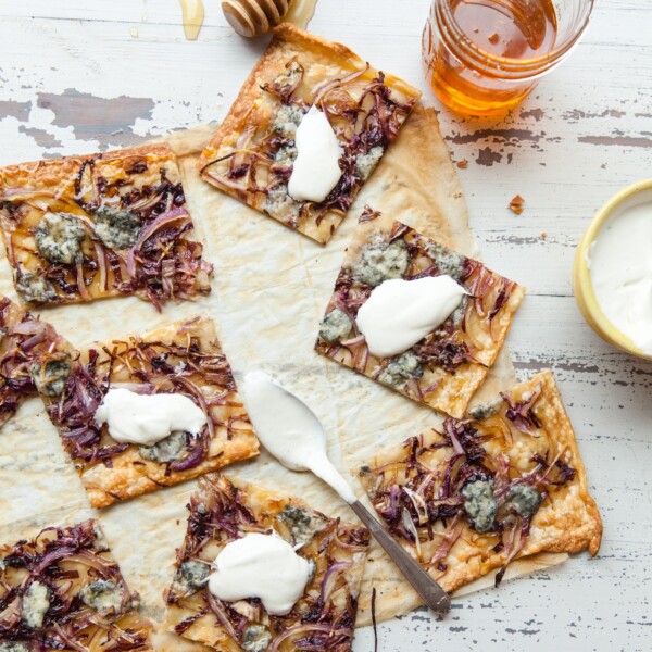 Blue Cheese, Radicchio, Onion and Honey Flatbread Strips on parchment paper.