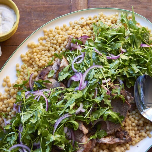 Slow Cooked Herbed Leg of Lamb with Fresh Herb and Arugula Salad