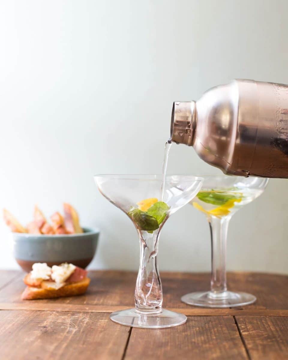 pouring a sake cocktail