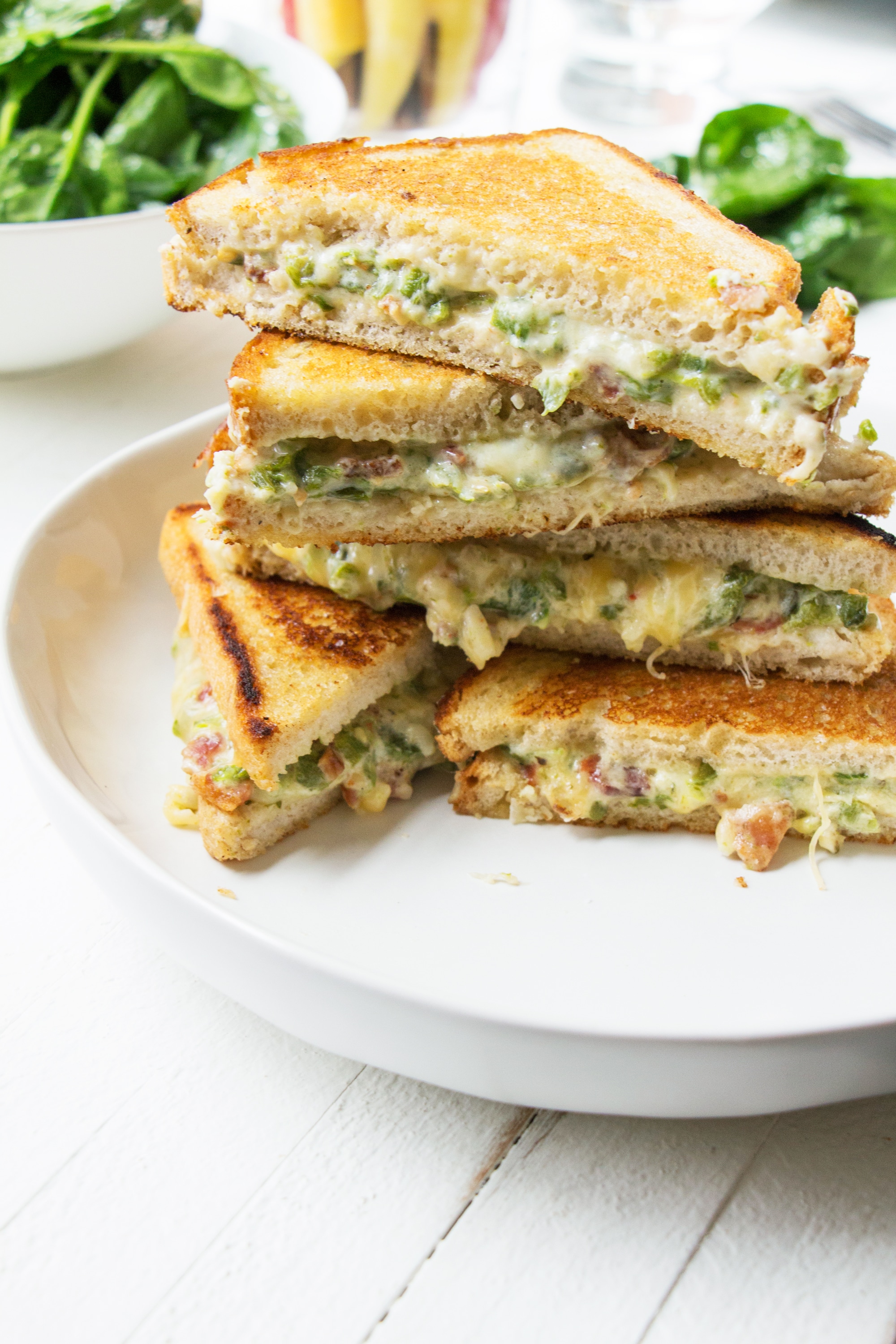 Stack of Jalapeno Popper Grilled Cheese sandwiches.