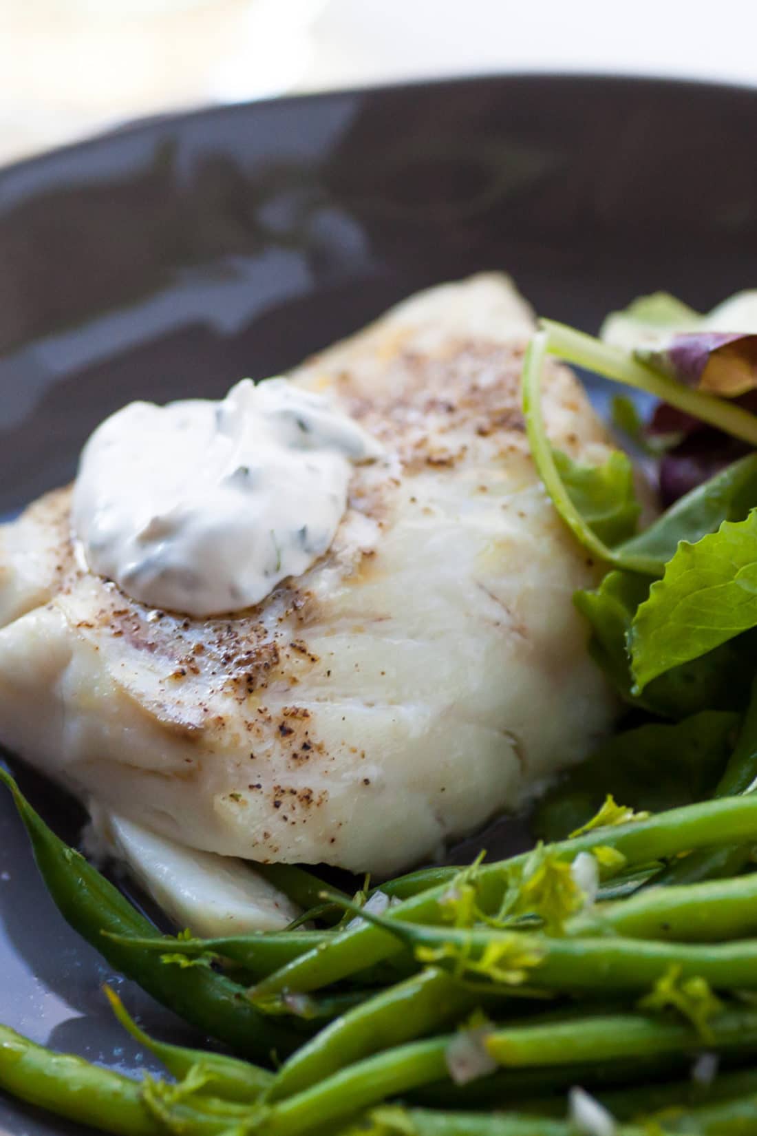 Dollop of fresh herb sauce on Cod.