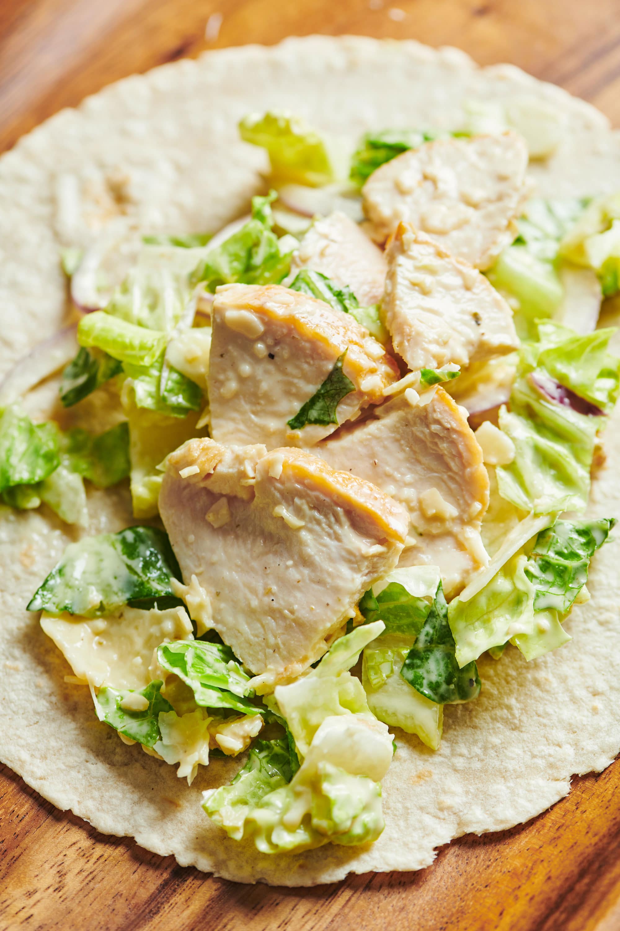Grilled Chicken Caesar Salad filling on a wrap.