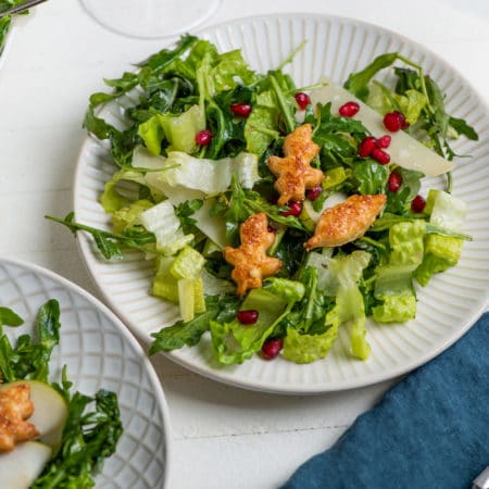 Green Salad with Pears, Parmesan and Pomegranate Seeds / Katie Workman / themom100.com / Photo by Cheyenne Cohen