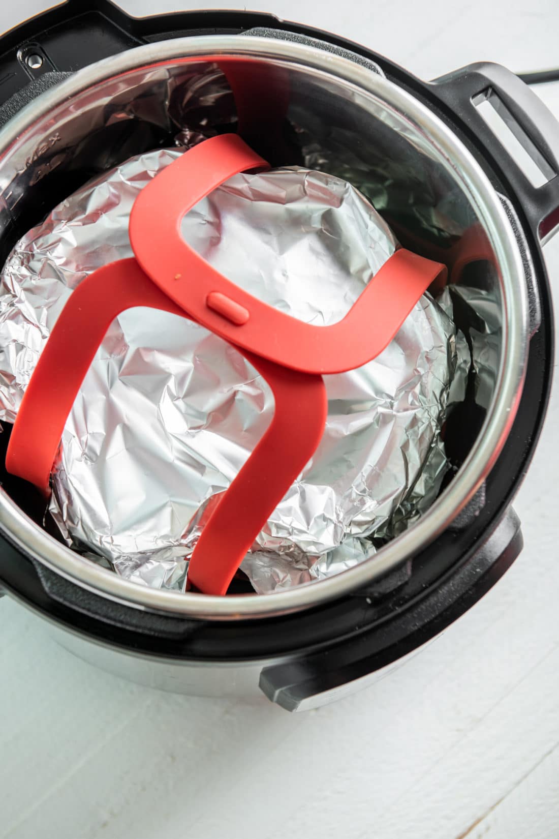 Sling in an Instant Pot with a pan covered in foil.