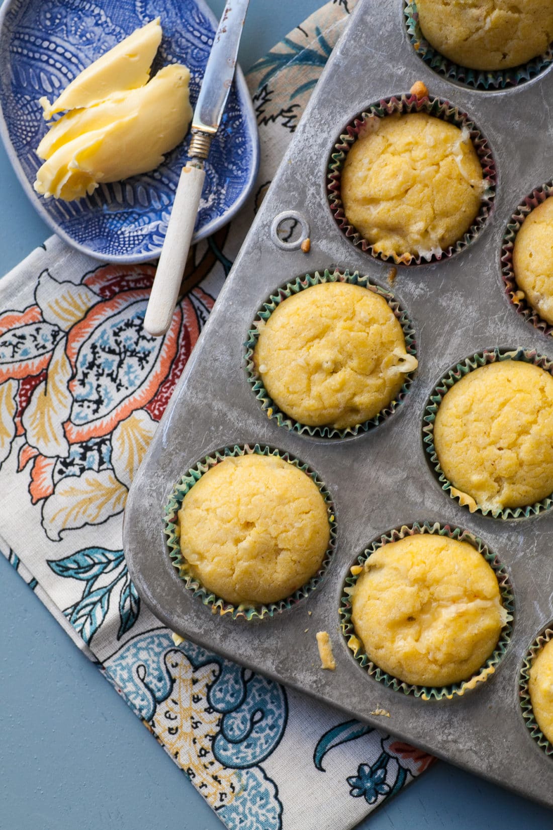 Muffin tin full of Pepper Jack and Green Chili Corn Muffins.