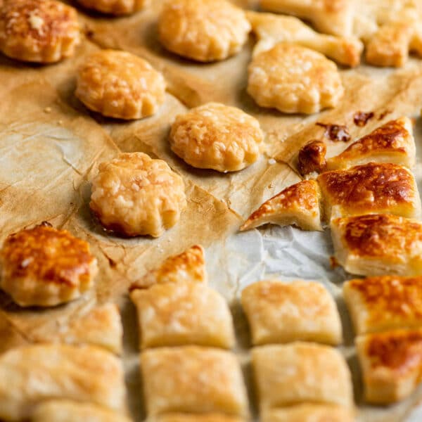 Puff pastry croutons on baking sheet.