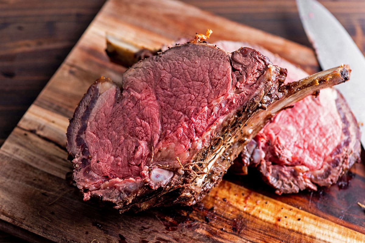 Standing Rib Roast on a cutting board.