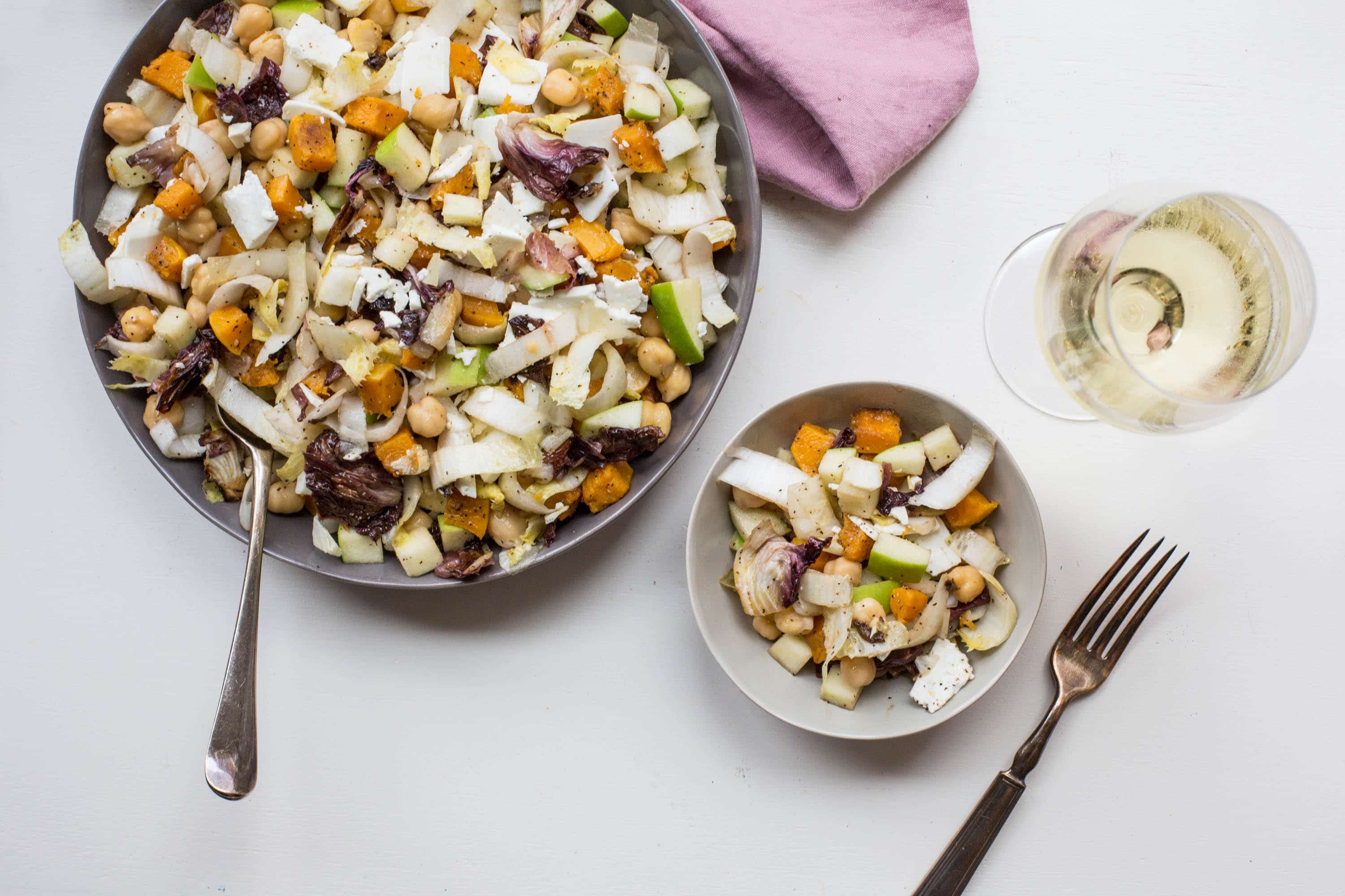 Chopped Winter Salad in two grey bowls.