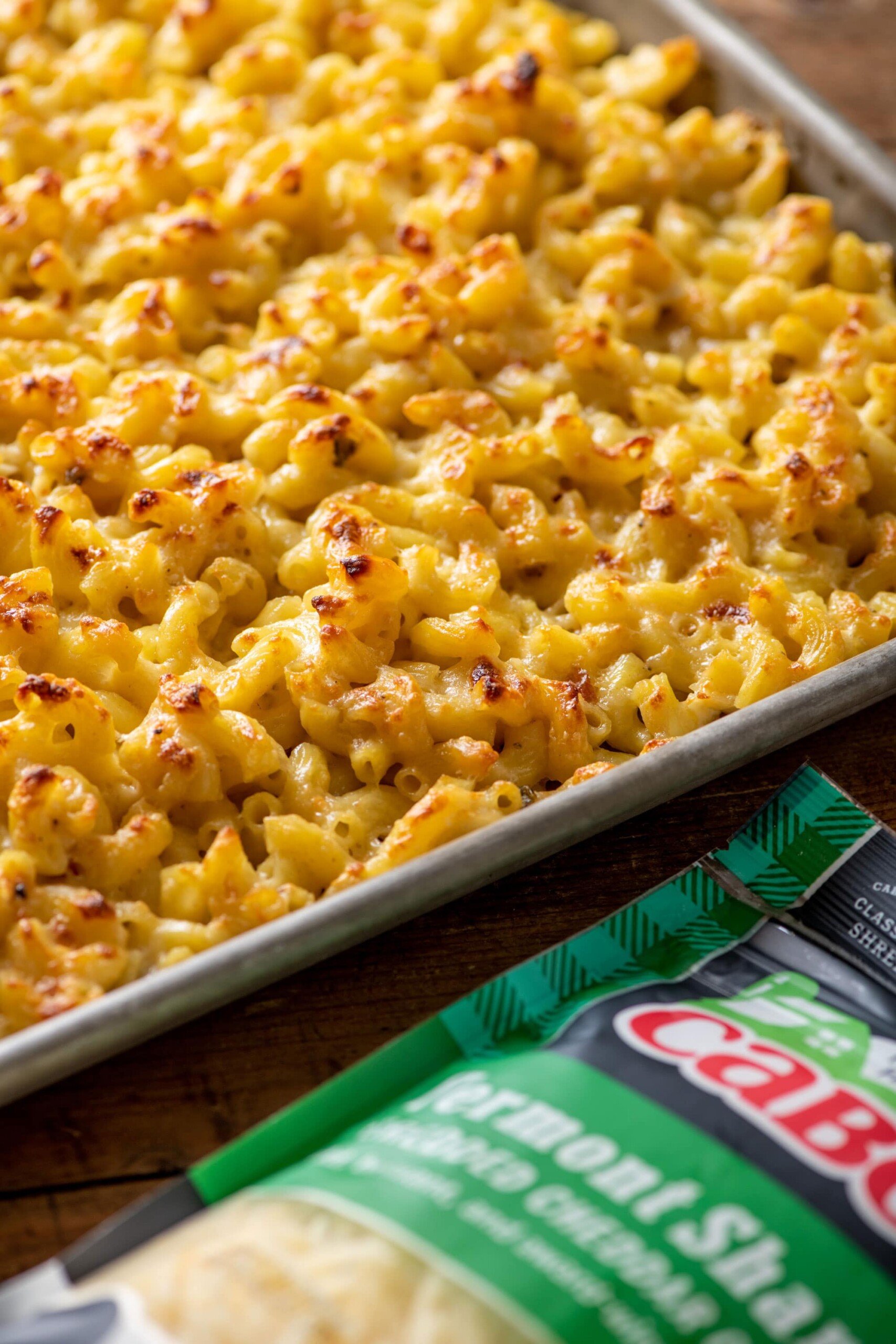 Sheetpan Macaroni and Cheese next to a bag of Cabot cheese.