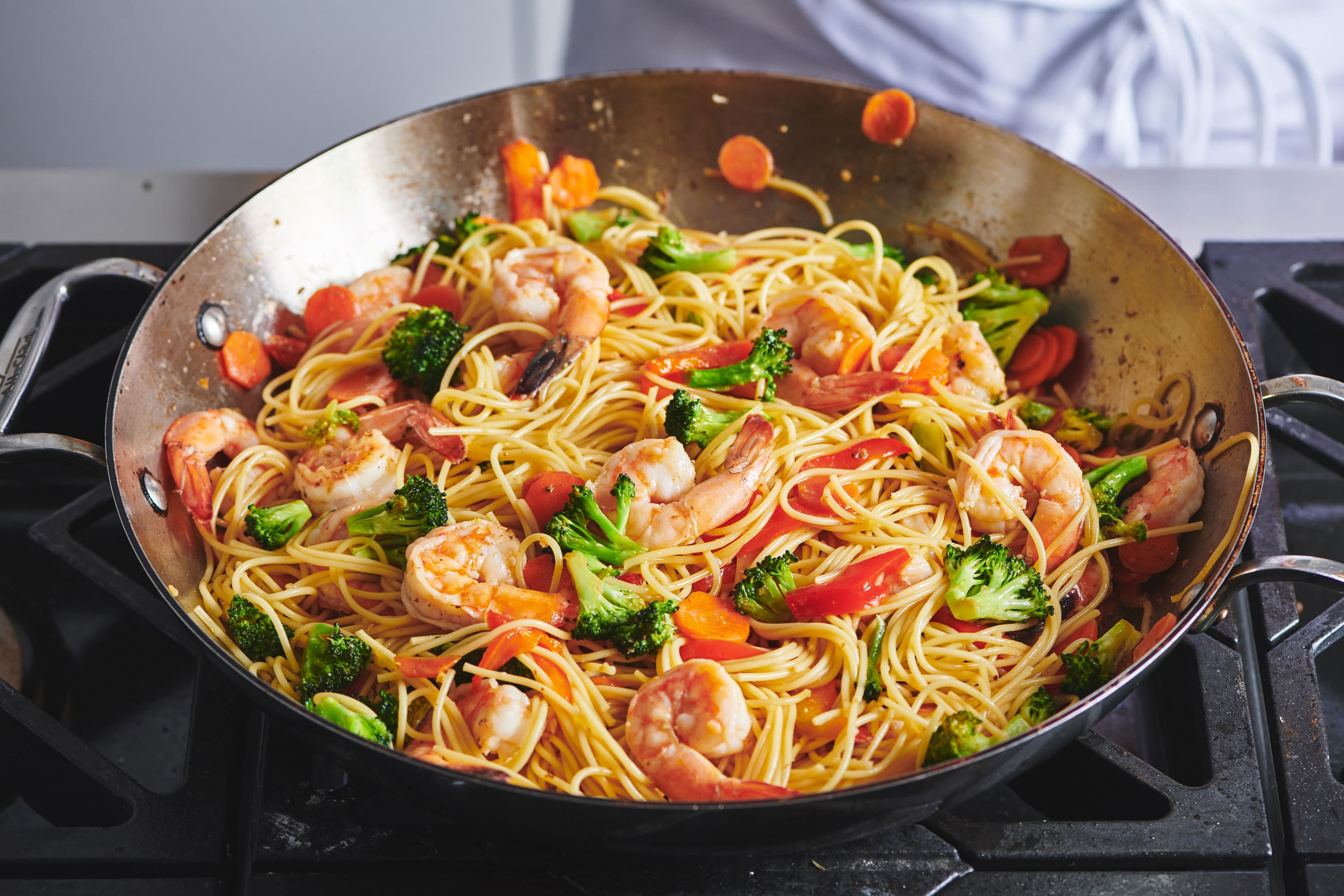 Wok filled with colorful Shrimp Lo Mein.