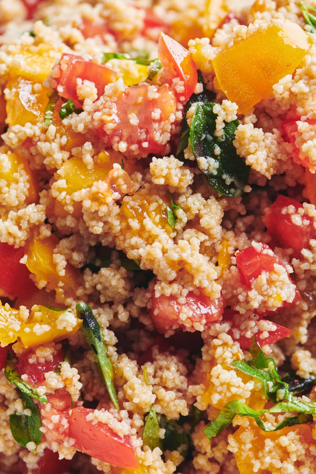 Bright and colorful Tomato Bruschetta Couscous piled high.