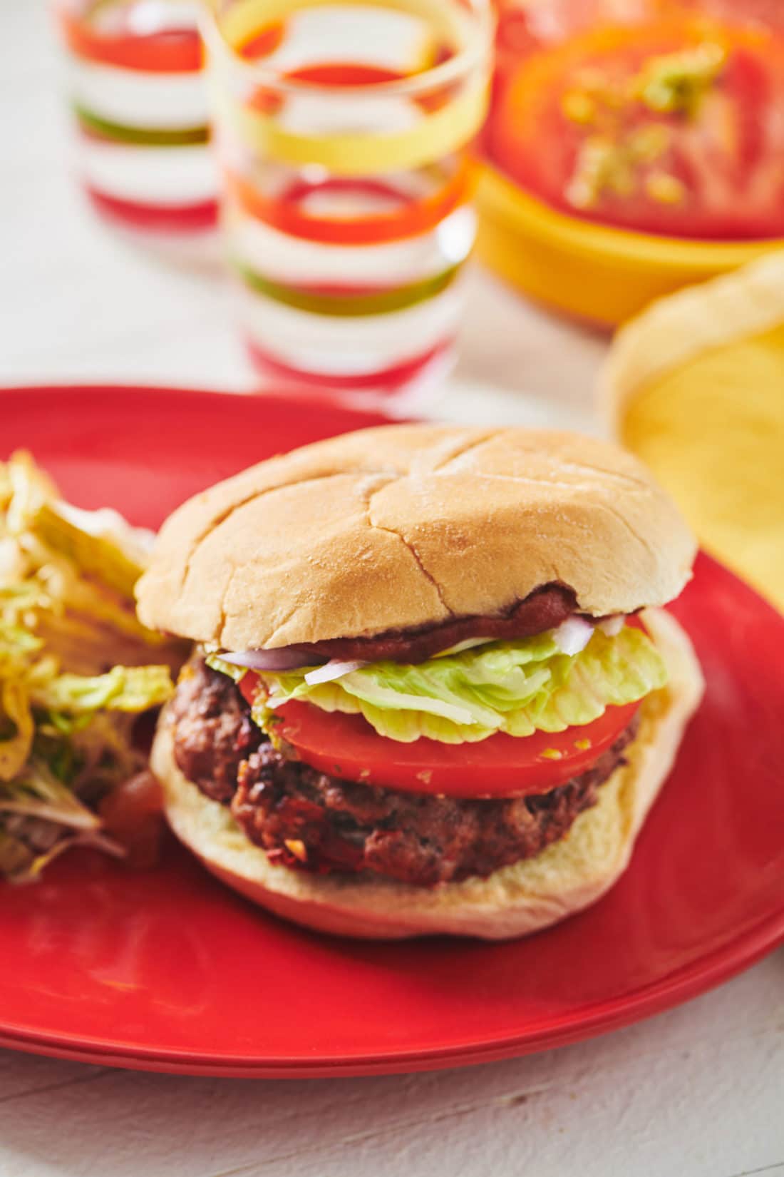 Chipotle Beef Burger on a red plate.