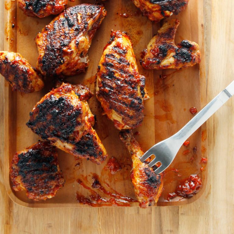 Barbecued Chicken on a wooden surface.