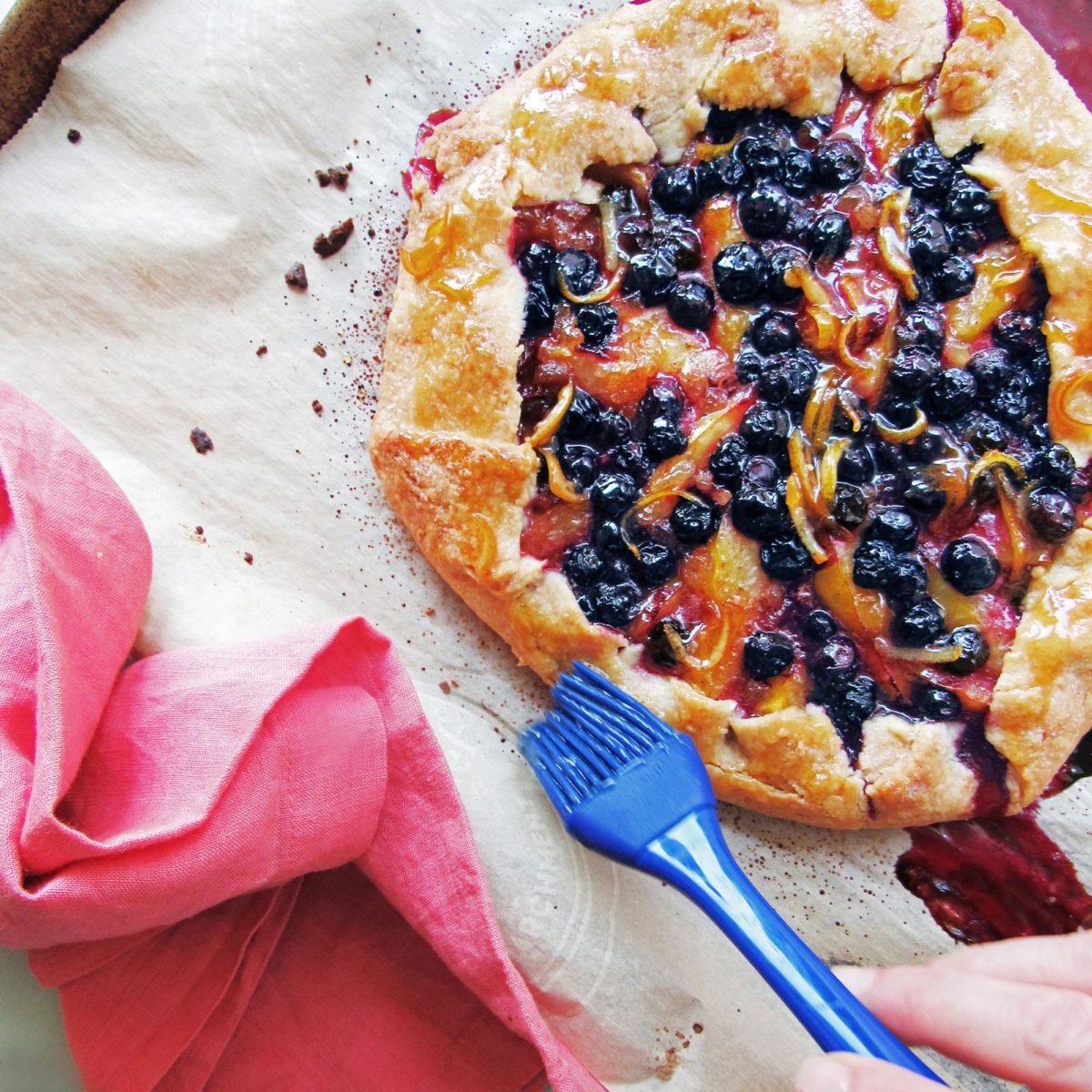 Brush the cooked galette with preserves and cool.
