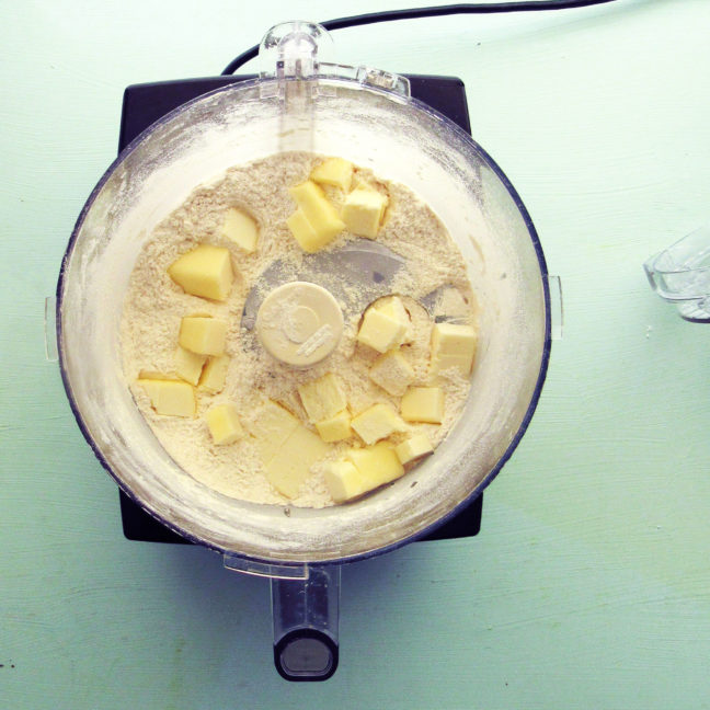 Cutting butter into dry ingredients in a food processor
