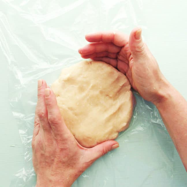 Forming crostada dough into a disk for chilling