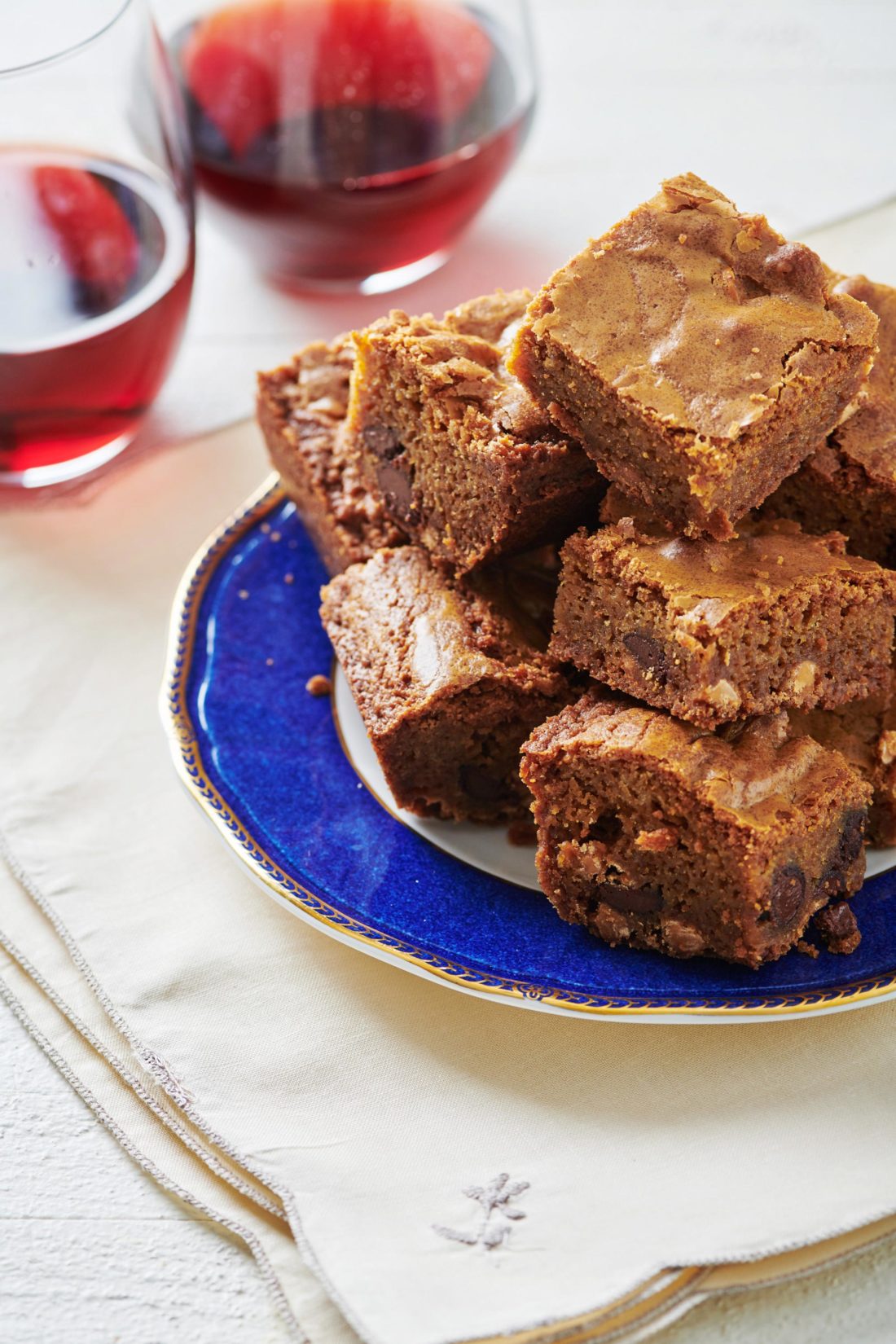 Blondies piled high on a plate.