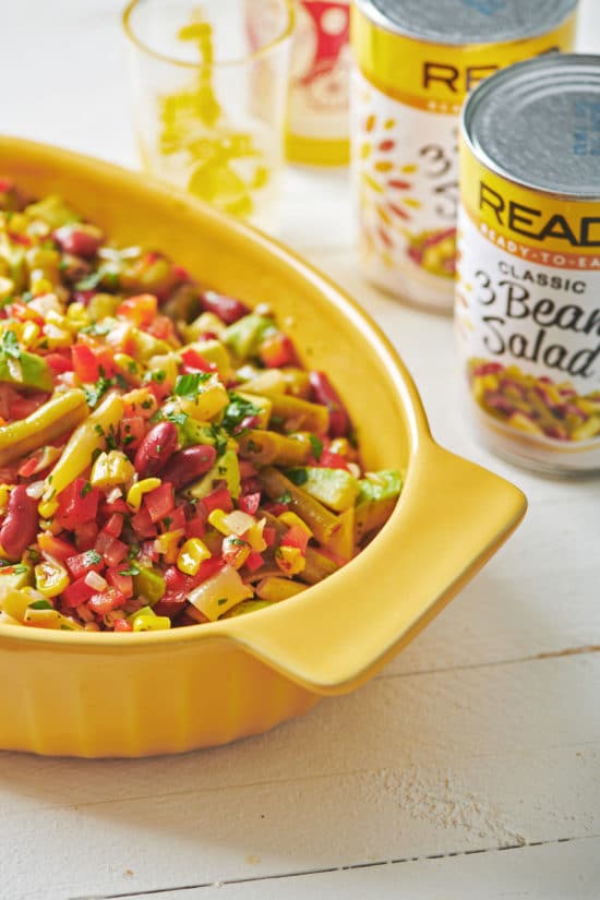 Mexican Avocado, Corn and Three Bean Salad next to a can of Read three bean salad.