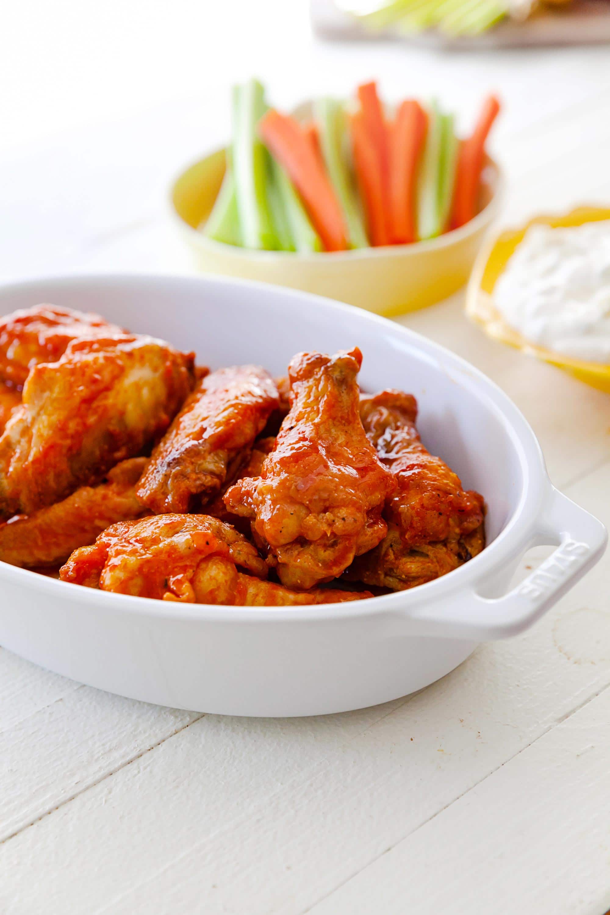 Air Fryer Buffalo Chicken Wings in a white serving dish.