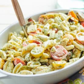 Serving dish with Pasta Salad with Tomatoes, Feta, and Herbed Mayonnaise.