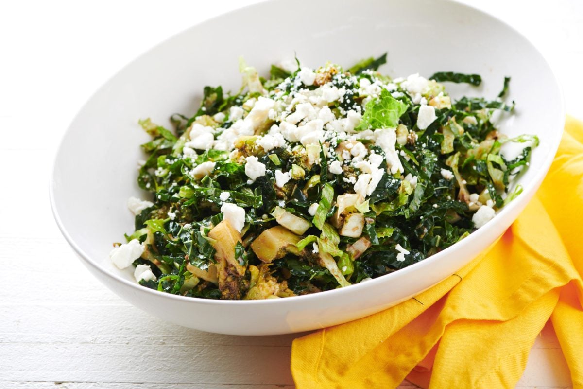 Romaine, Kale and Broccoli Salad in a large white bowl.