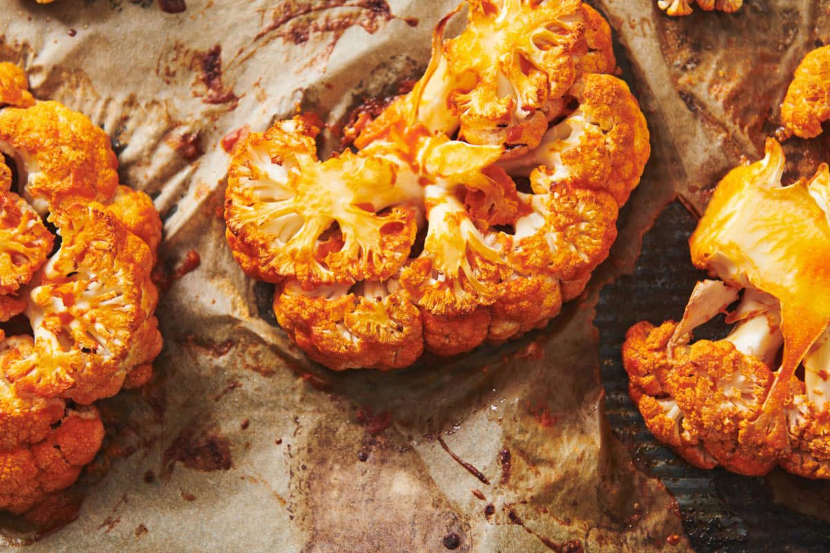 Roasted Buffalo Cauliflower Steaks on baking sheet.