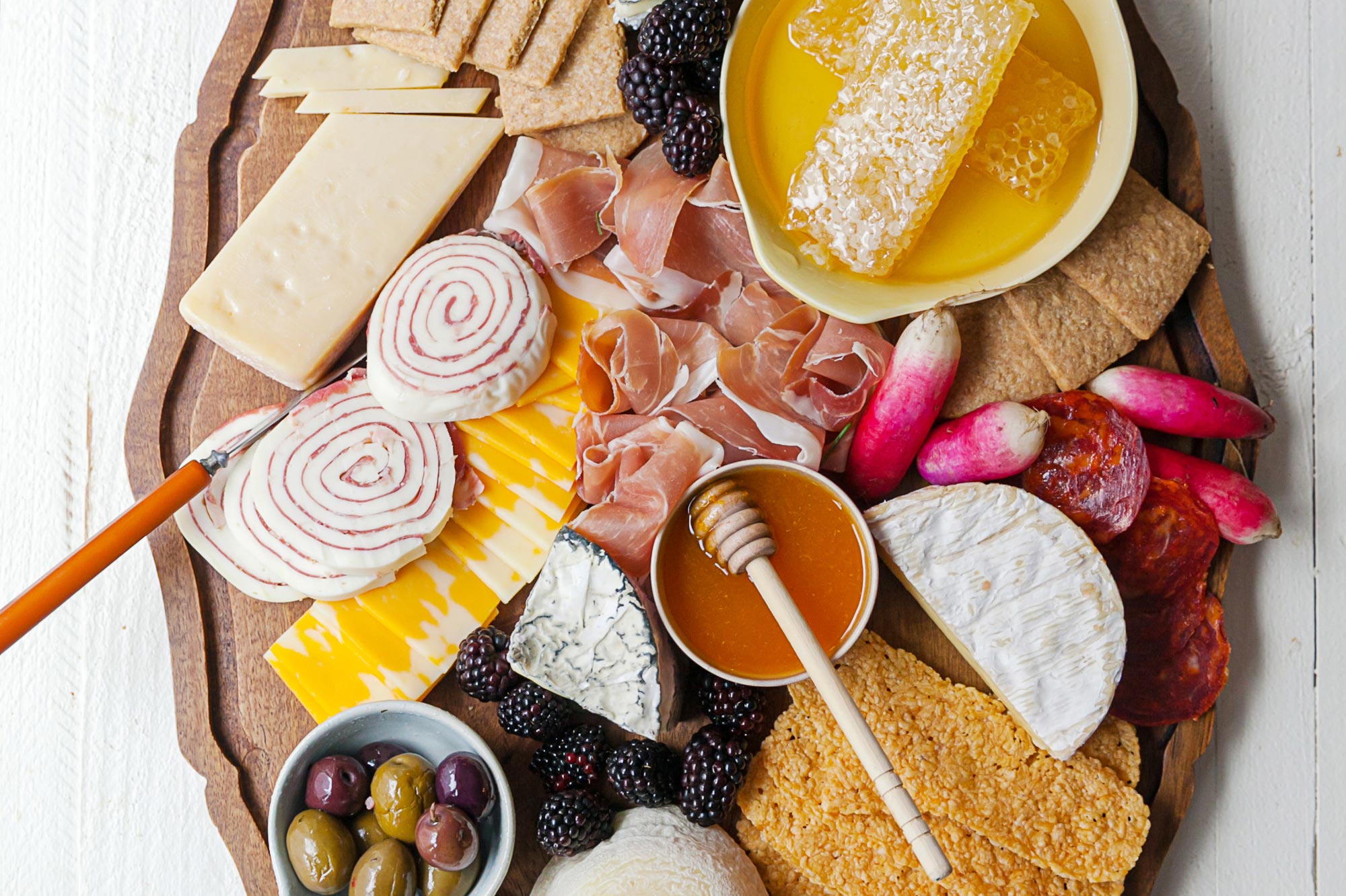 Cheeses and charcuterie on a Graze Board.