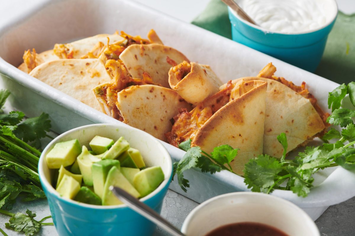 White dish of Baked Chicken Quesadillas.