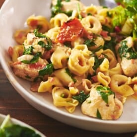 Tuscan chicken tortellini in bowl.