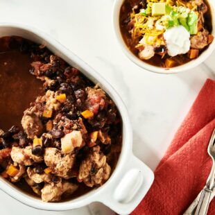 Chicken Chili in a bowl and in a crock pot.