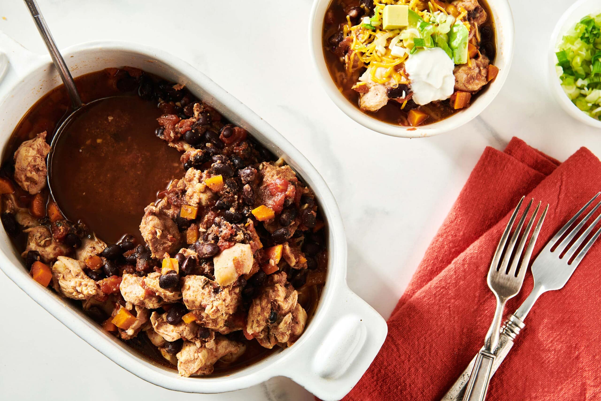 Chicken Chili in a bowl and in a crock pot.