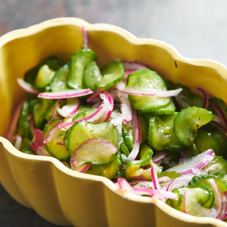 Cucumber Salad in a yellow bowl.