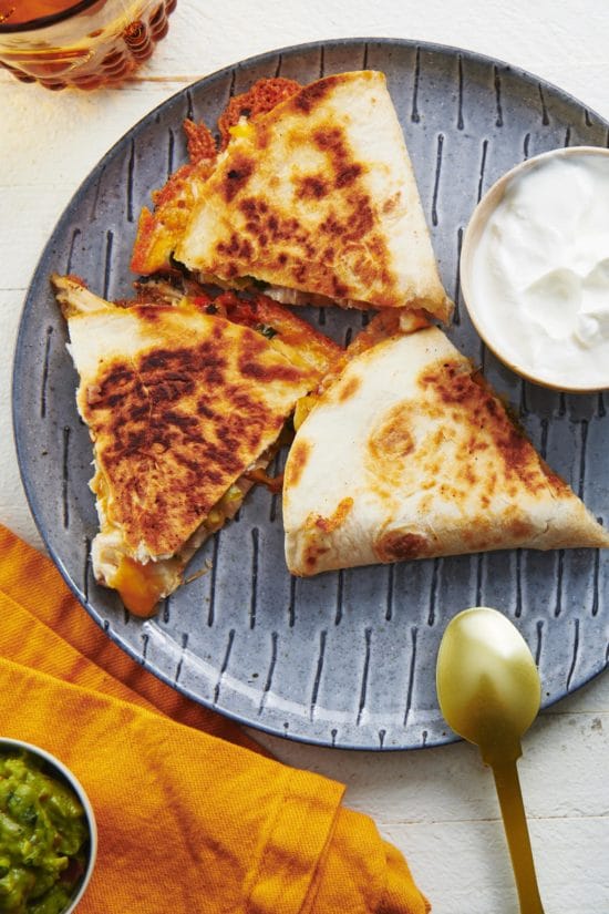 Chicken and Vegetable Quesadillas on a blue plate.