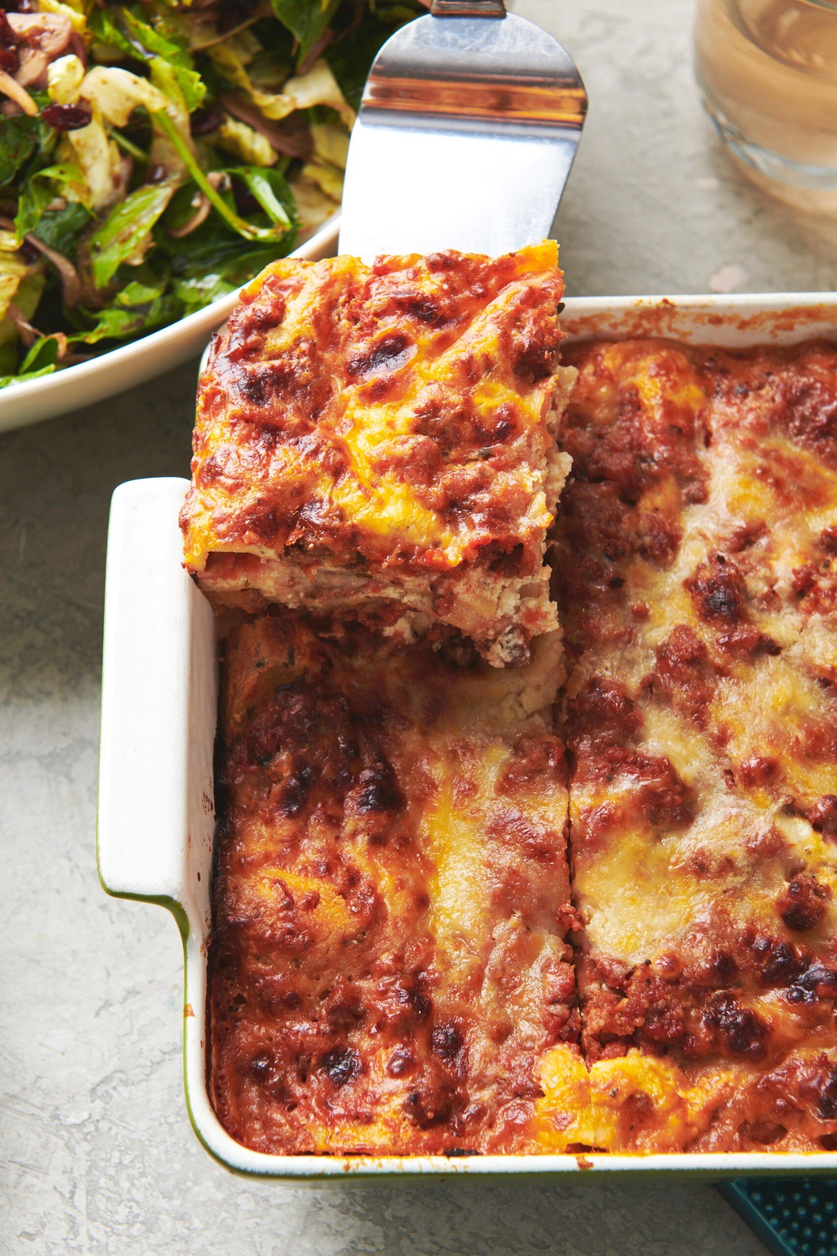Spatula with a piece of Meat Lasagna.
