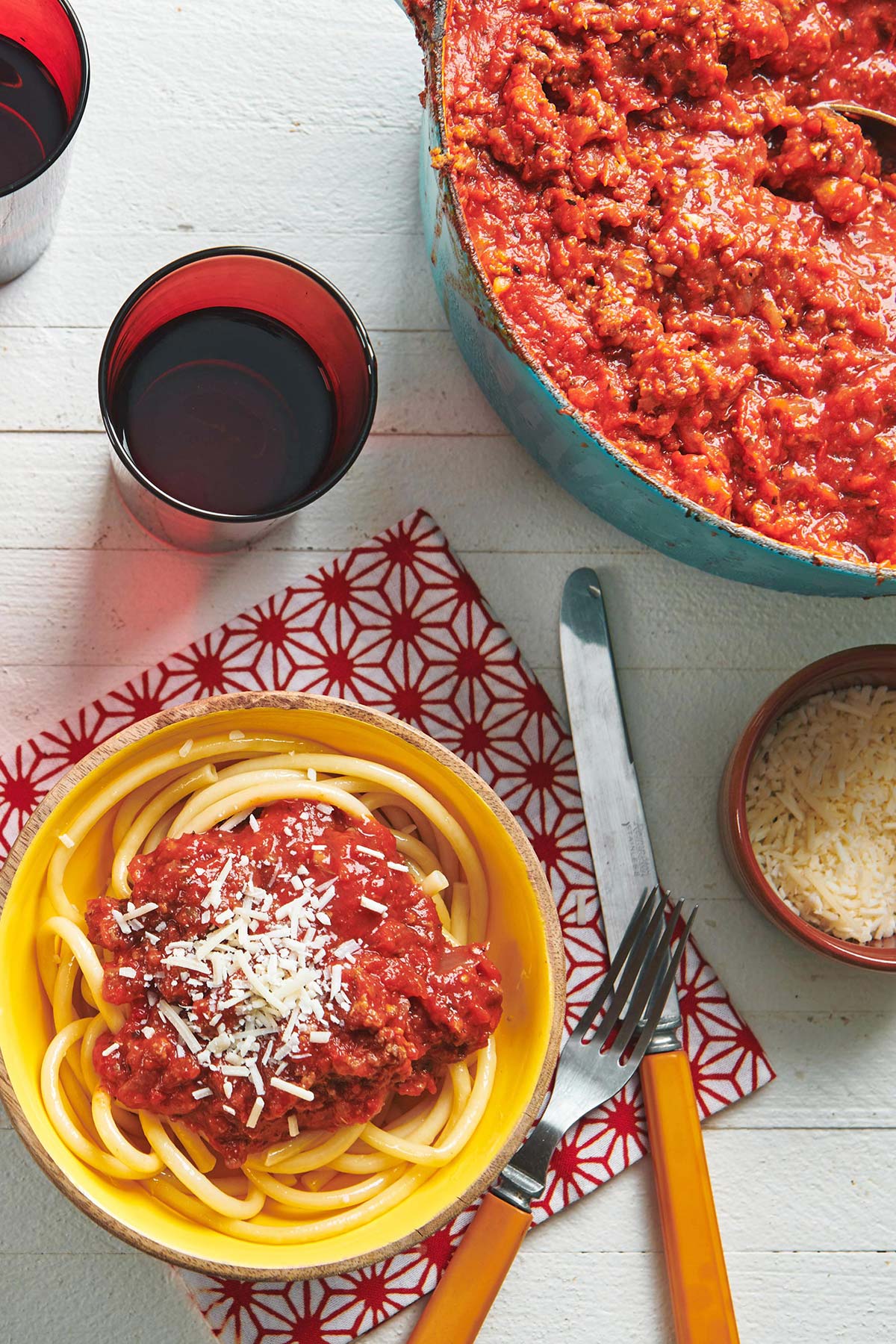 Meat Sauce in a pan and on noodles.