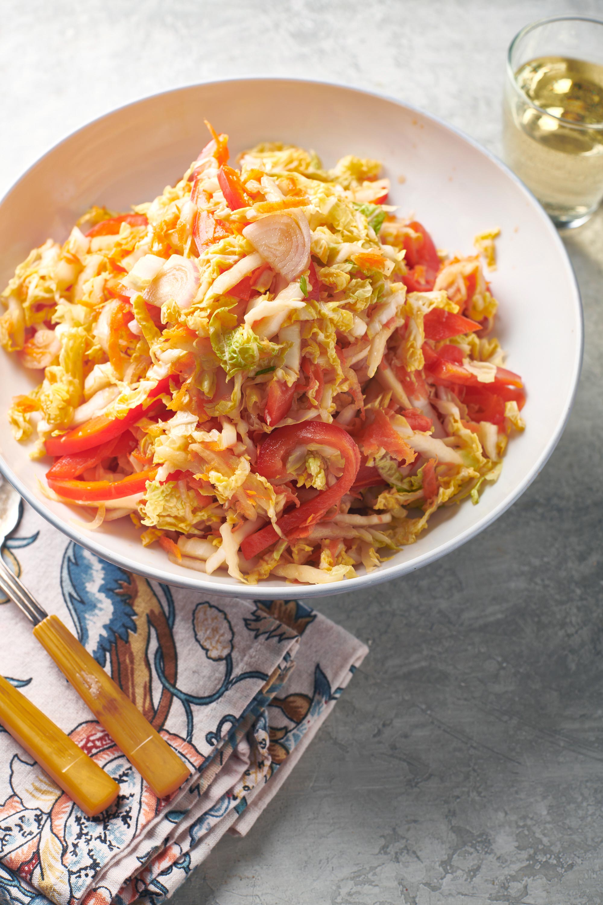 White bowl of Vegan Asian Napa Cabbage Slaw.