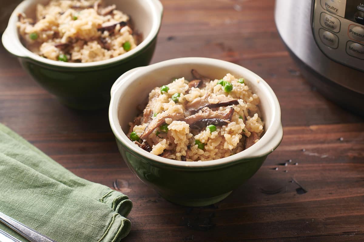 Mushroom Risotto in green bowls.