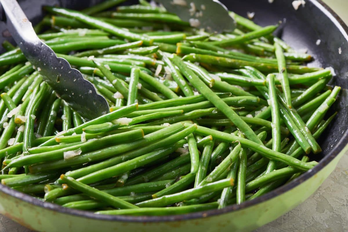 Sautéed Green Beans with Thyme Butter in a skillet.