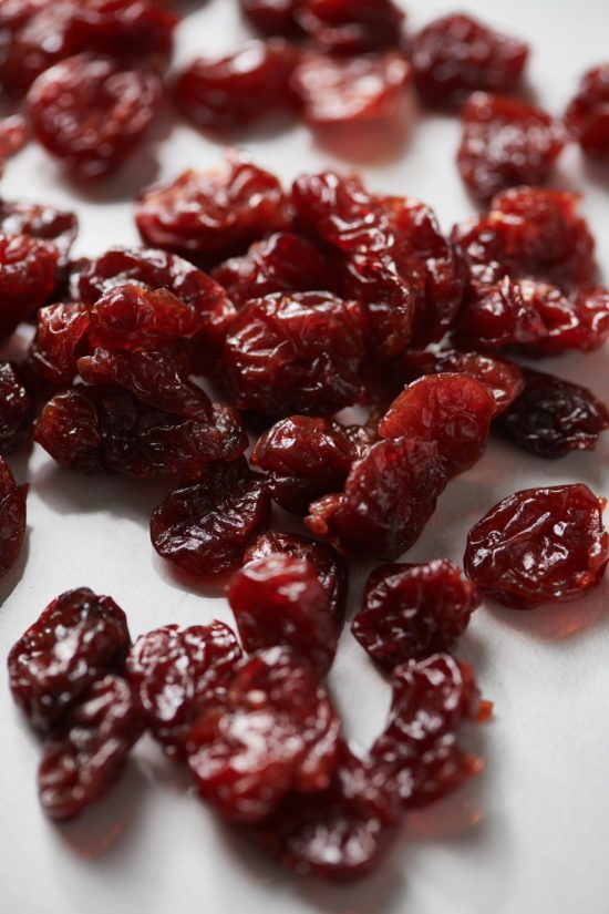 Dried cherries on parchment paper.