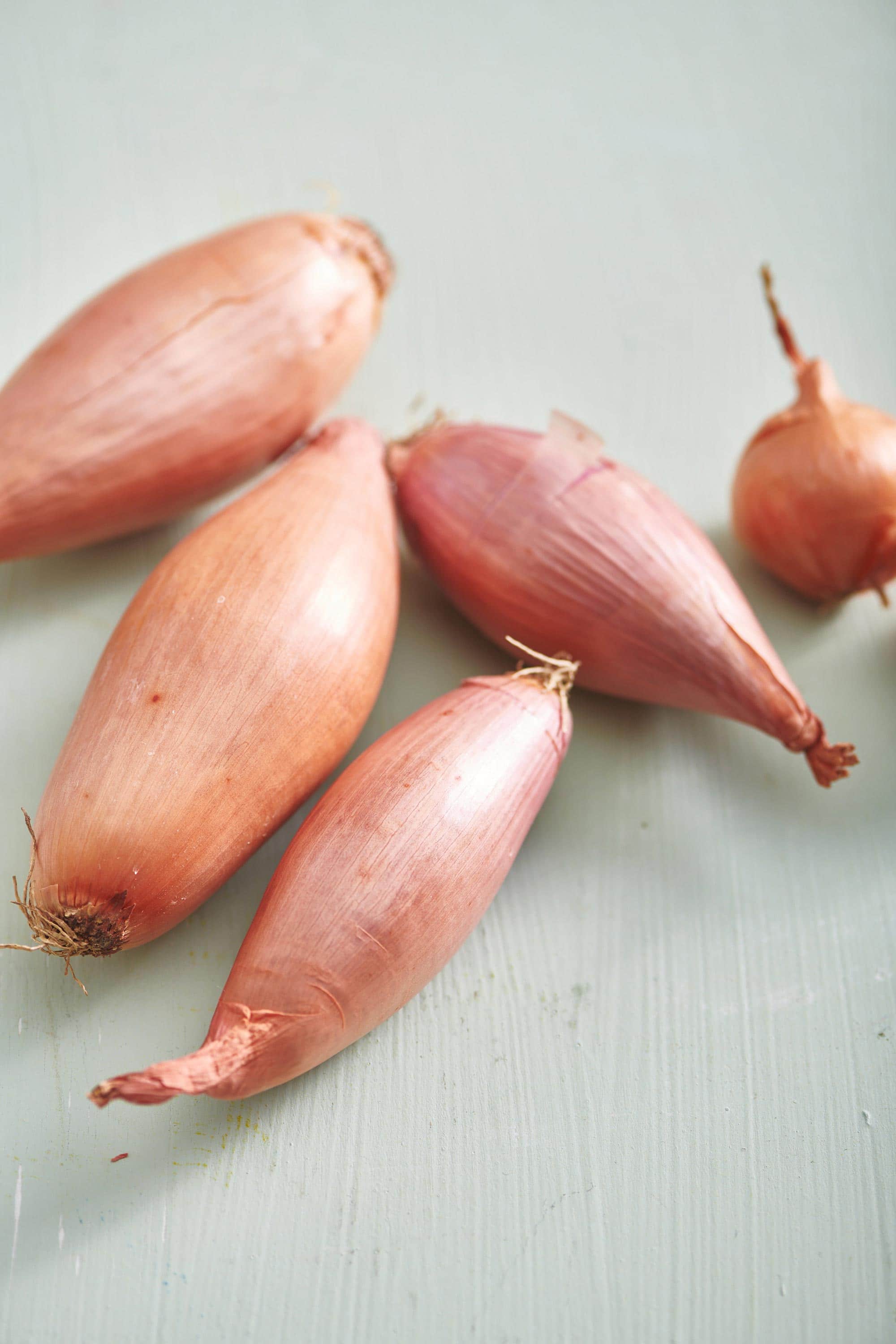 Shallots on a surface.