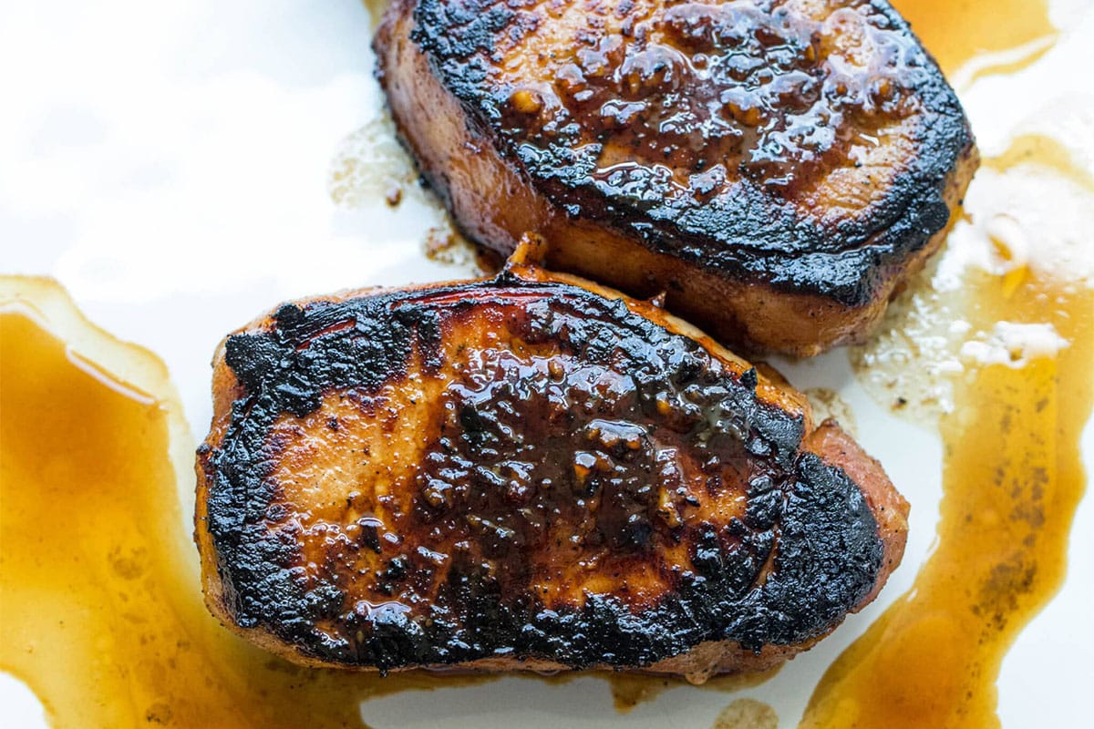 Korean Pork Chops on a white plate.