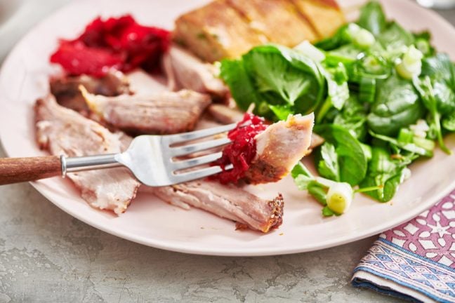 Cranberry Orange Sauce and turkey on a fork.