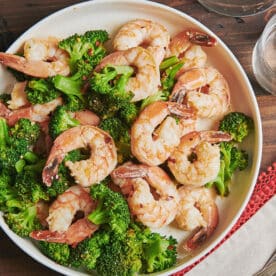 Garlicky Shrimp and Broccoli with Meyer Lemon on plate.