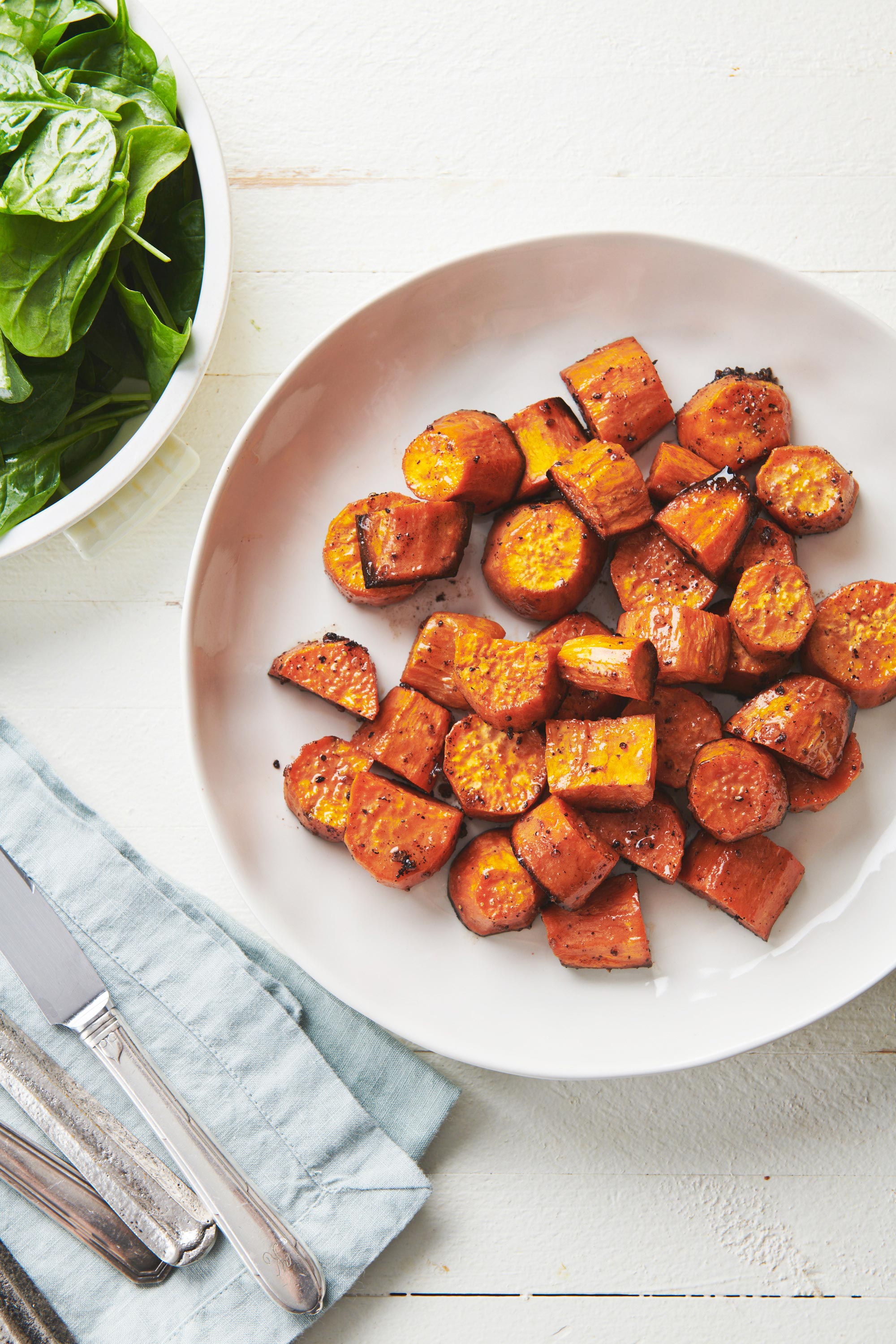 Butter-Roasted Sweet Potatoes on a white plate.