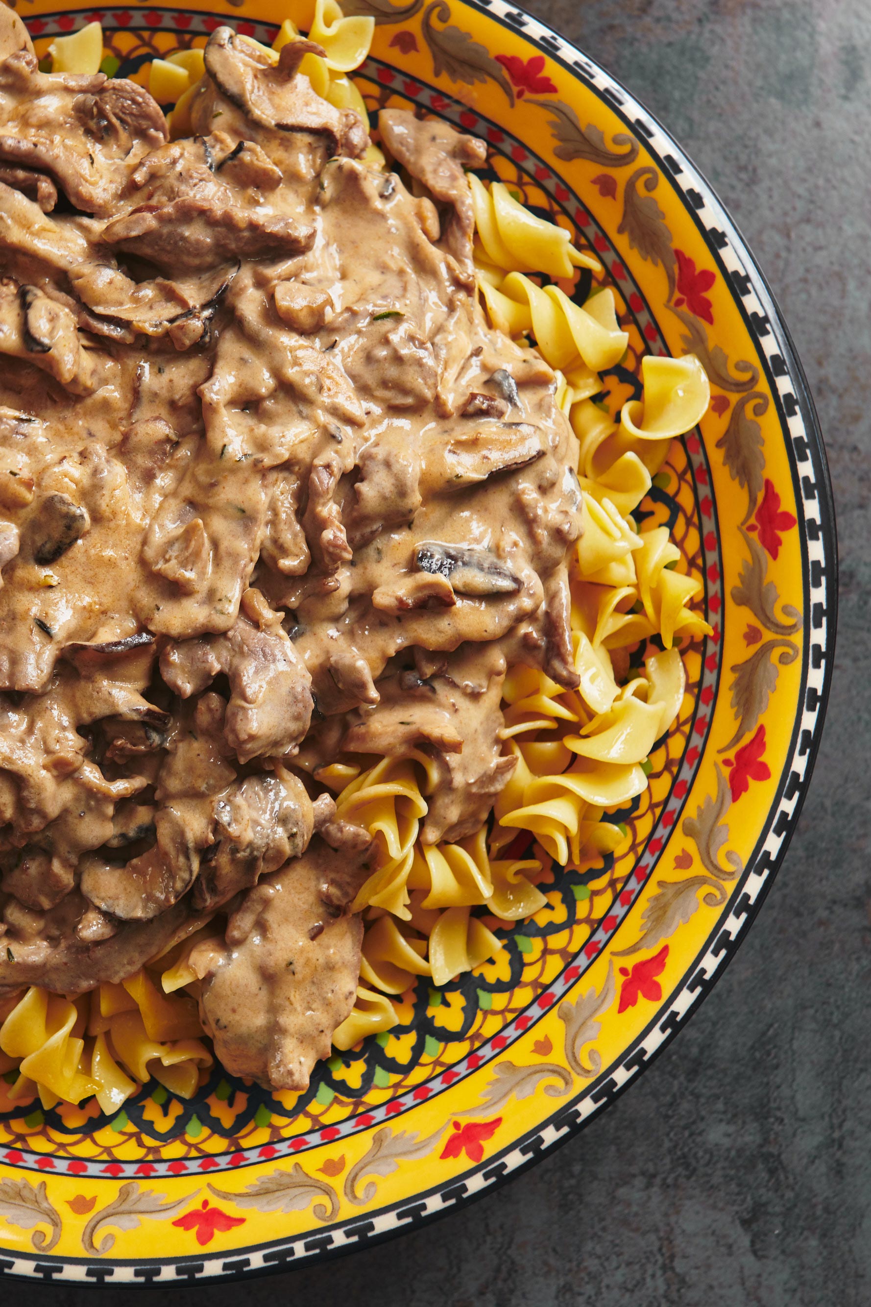 Beef Stroganoff in a colorful bowl.