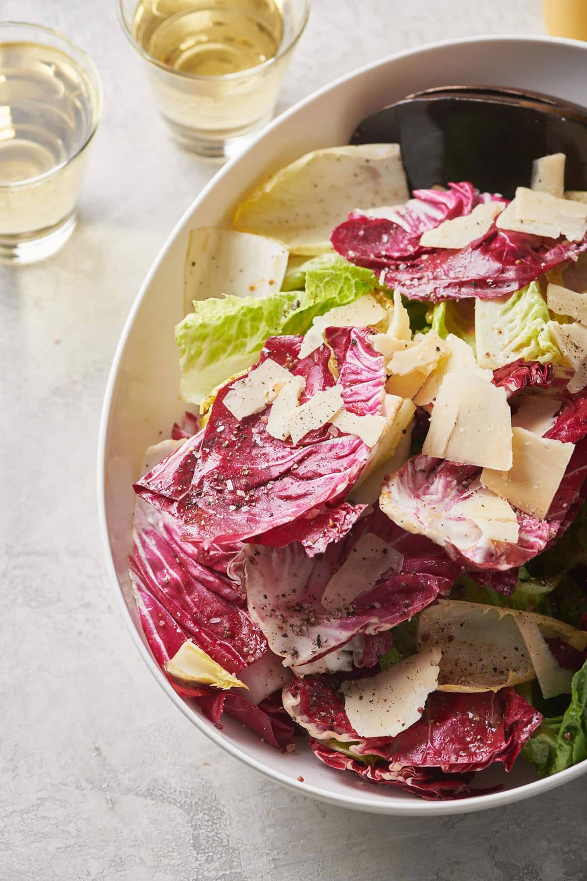 Bowl of Mixed Lettuce Salad with Mustard Vinaigrette.