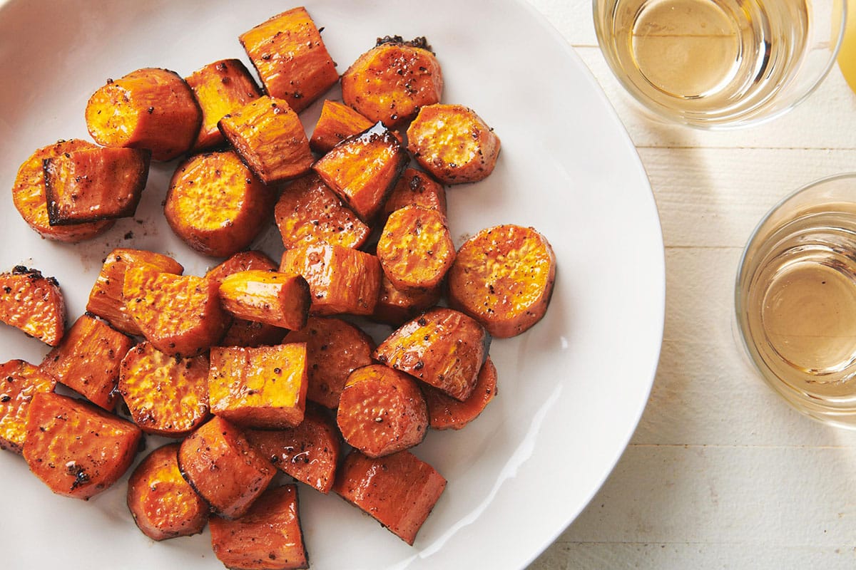 Butter-Roasted Sweet Potatoes on a white plate.