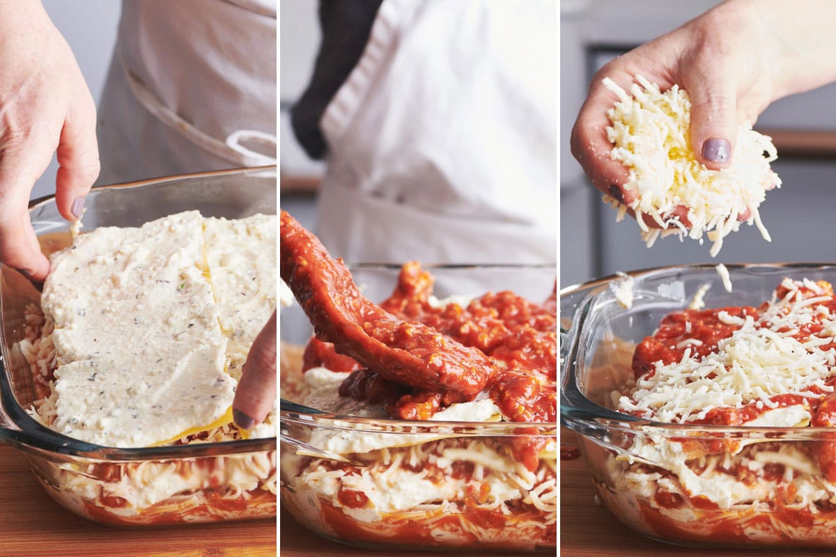 Layering ingredients for turkey lasagna in glass baking dish.