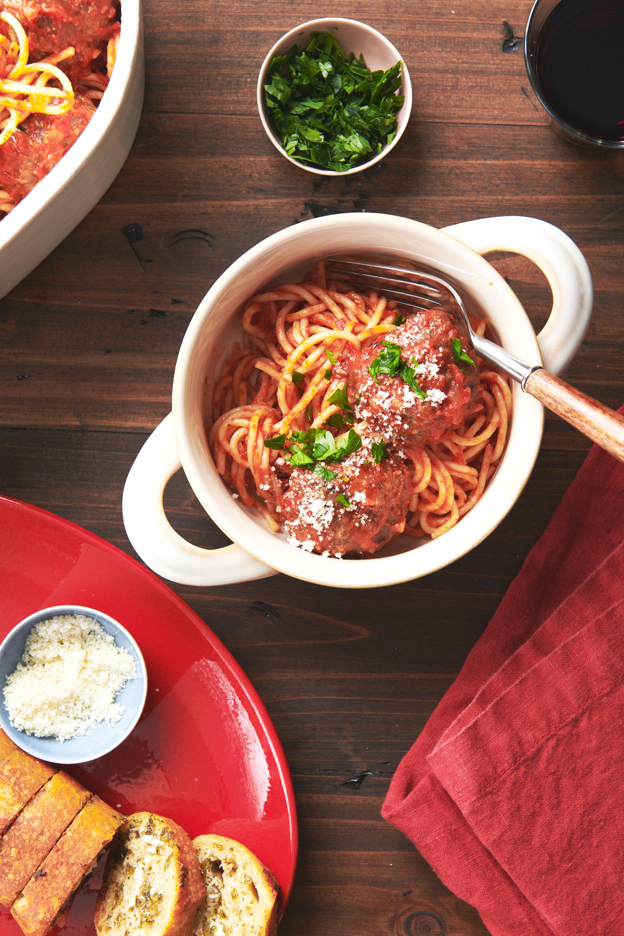 Handled bowl of Spaghetti and Meatballs with Tomato Sauce.