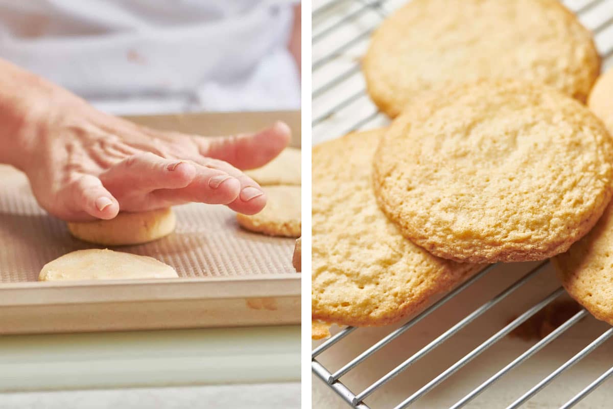 Woman pressing cookie dough and baked sugar cookies on wire rack.